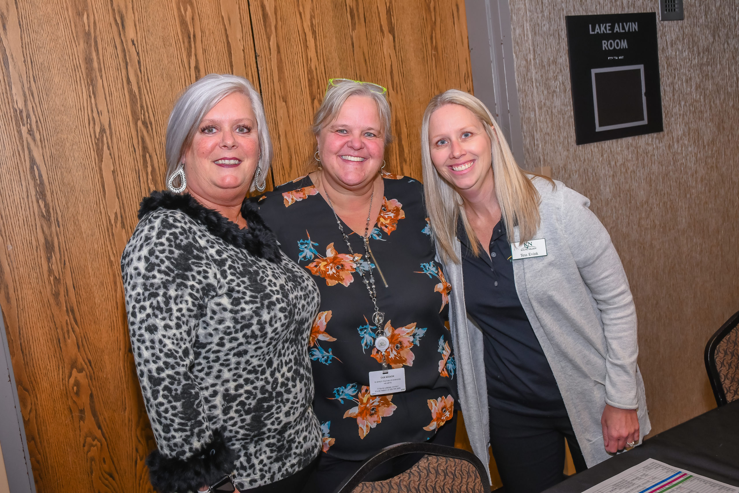 Three women pose for photo