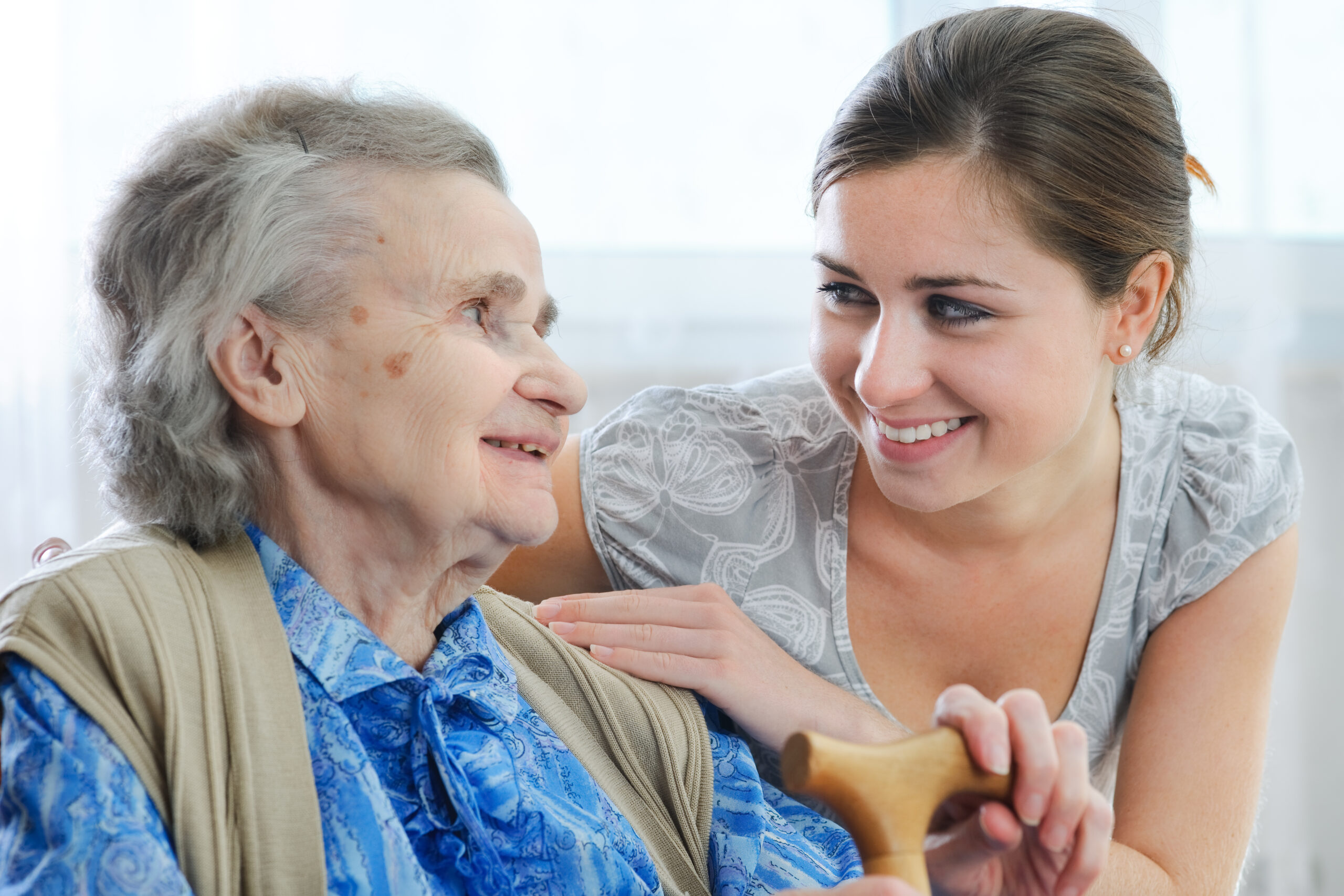 Senior woman with her home caregiver